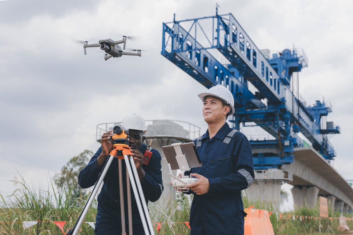 Field engineers with drone equipment
