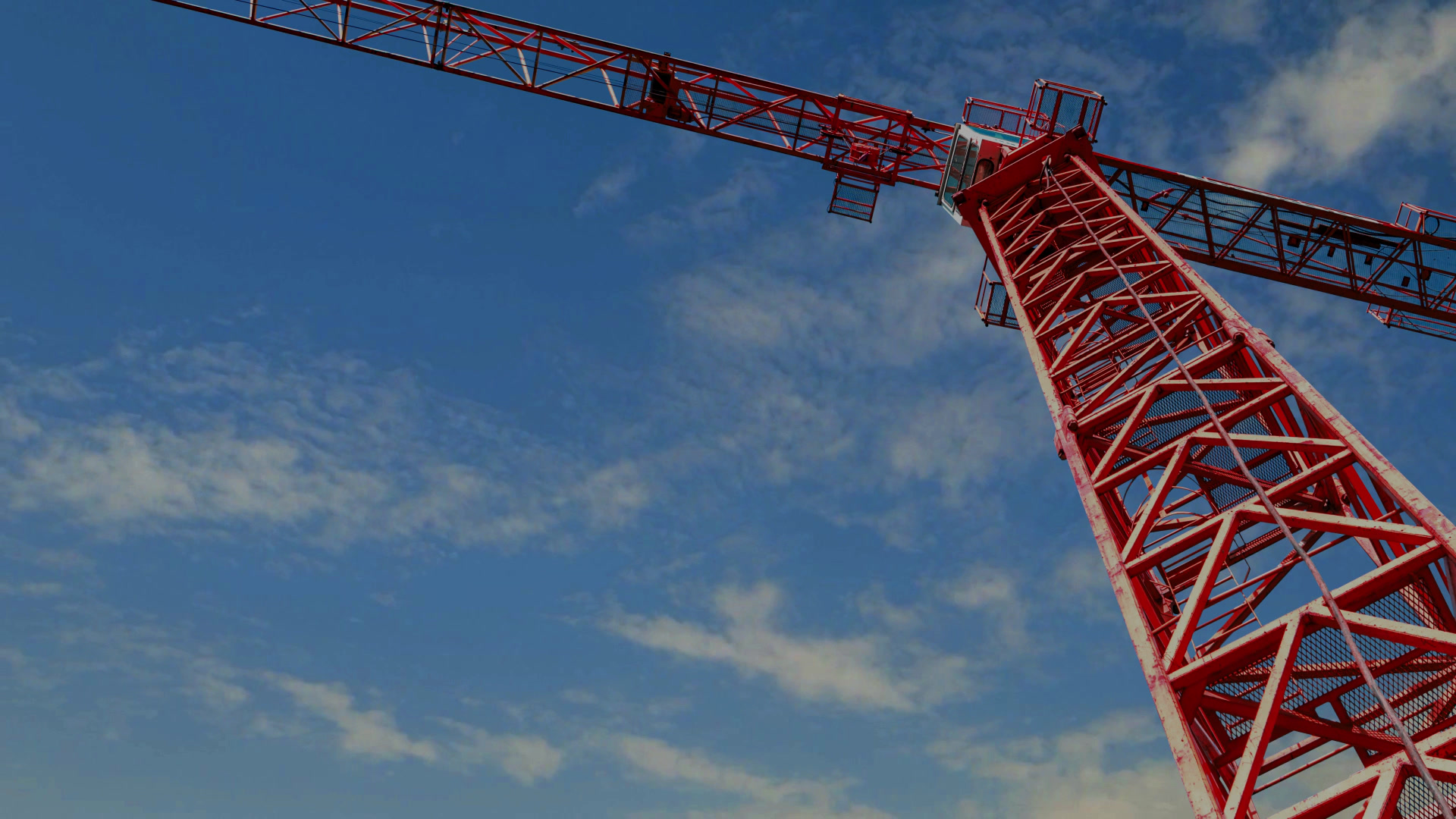 Tower crane against blue sky